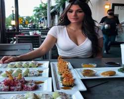 Kayleigh Noelle eating non vegetarian food